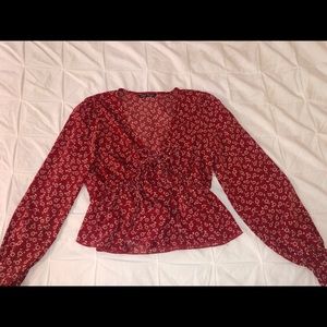 Floral long sleeved blouse w/ synced waist